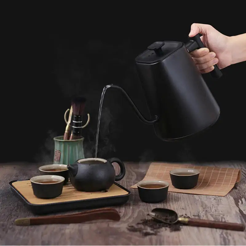 Black gooseneck kettle pouring hot water for perfect brewing with Electric Kettle 1.0 L