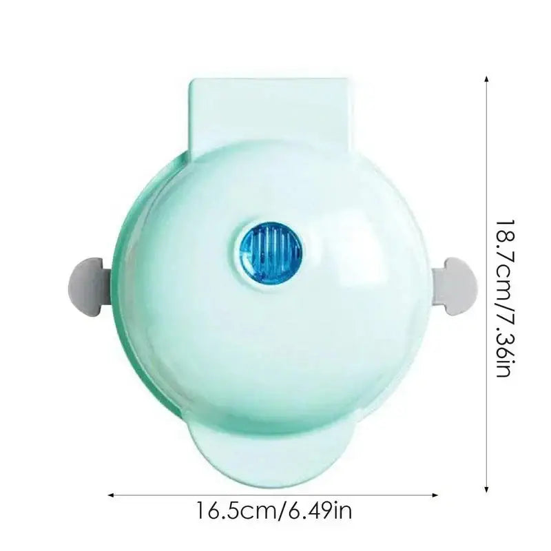 Mint green face mask with gray straps and blue valve for waffles kitchen cooking safety