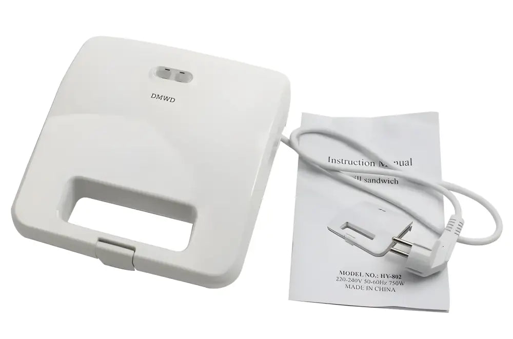 White electric Panini sandwich machine with instruction manual and power cord