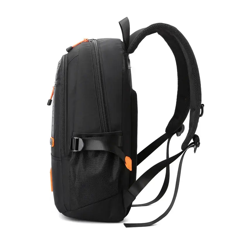 Black backpack with orange accents, adjustable straps, and quality nylon fabric design