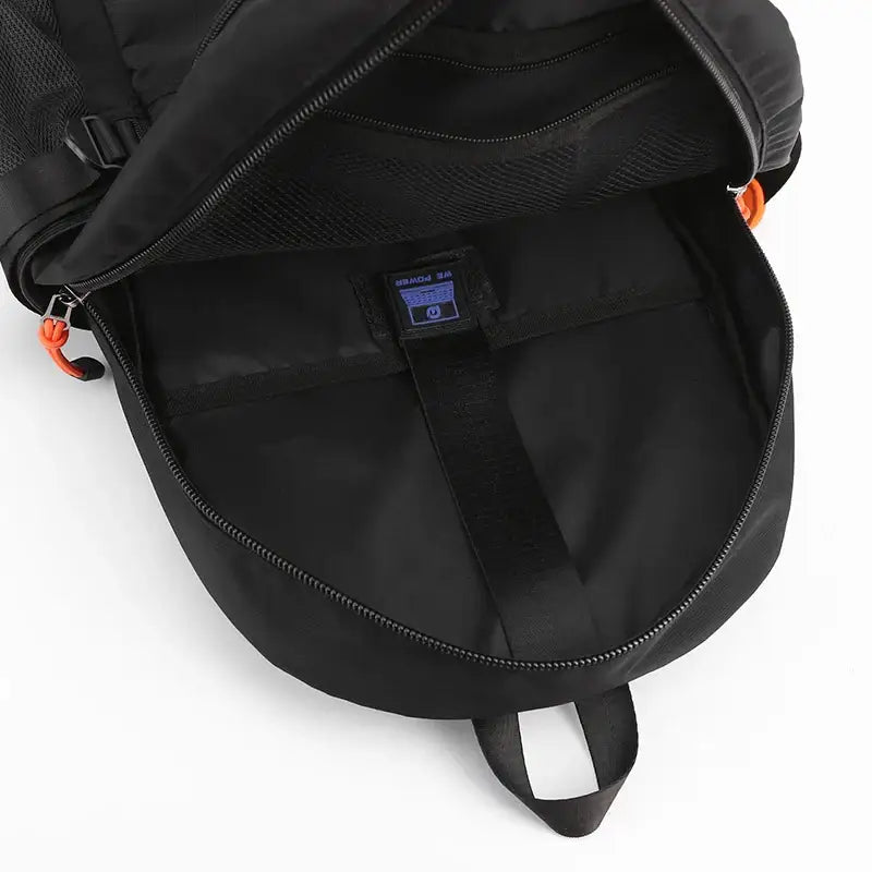 Black backpack with open main compartment showcasing quality nylon fabric interior lining