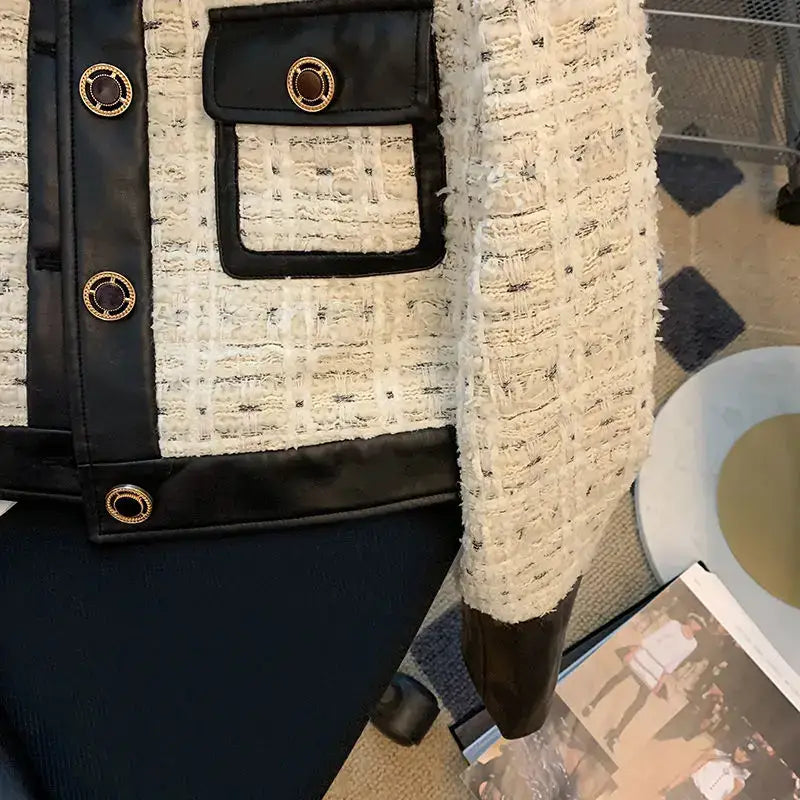 Black leather belt with brass grommets and white stitching for women single-breasted coats