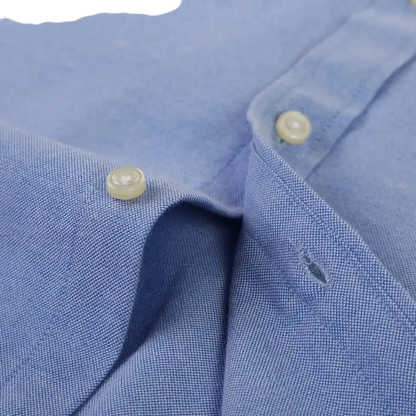 Blue and white striped casual shirt with classic collar and white buttons