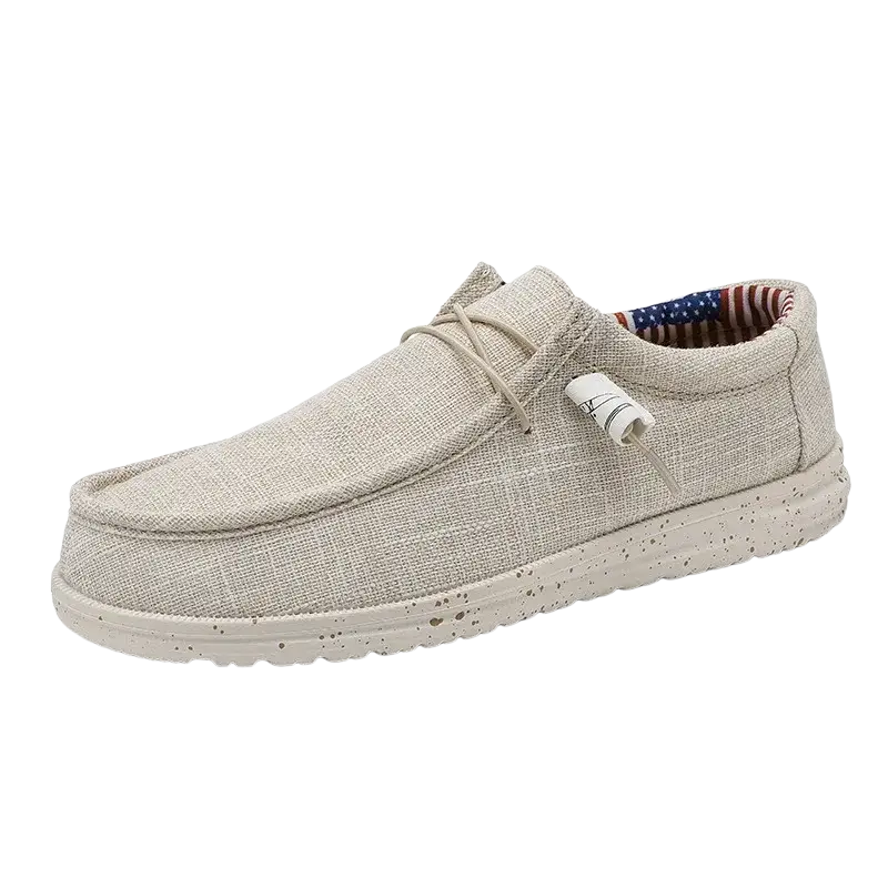 Beige canvas casual shoes with laces, textured sole and American flag design