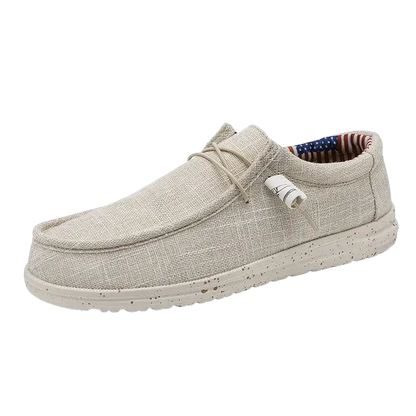 Beige canvas casual shoes with laces, textured sole and American flag design