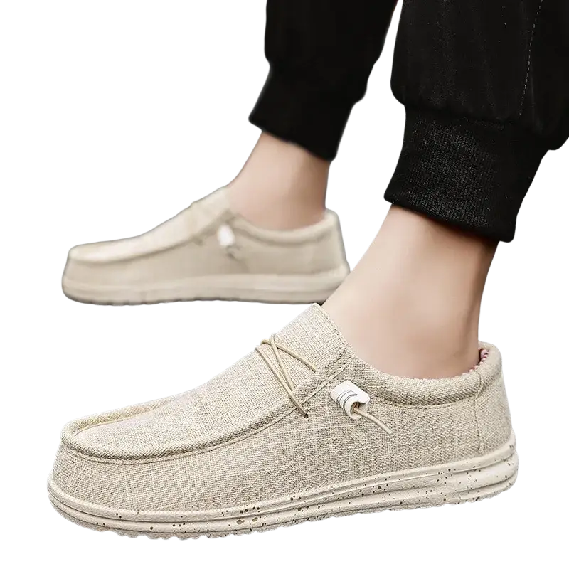 Beige canvas slip-on casual shoes with white soles and American flag design