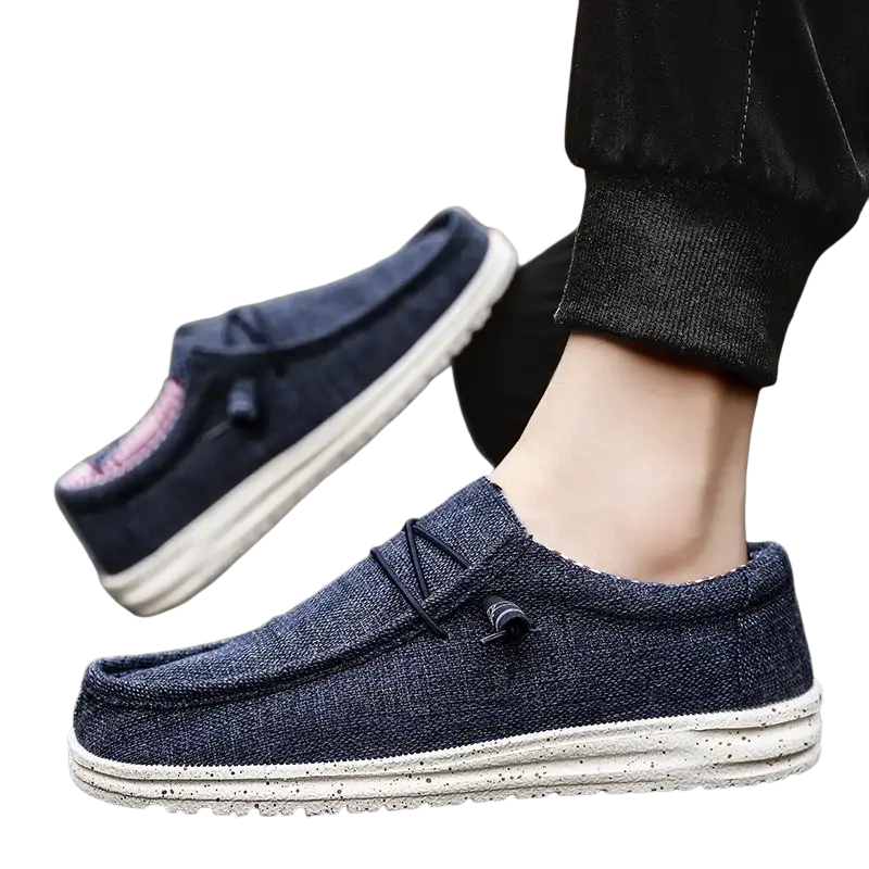 Navy blue moccasins with white speckled soles, casual shoes and adjustable strap