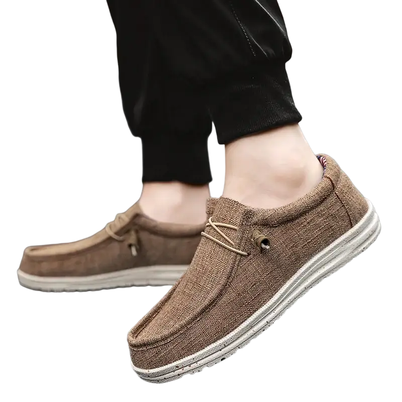 Brown canvas casual shoes with white soles, laces and American flag design