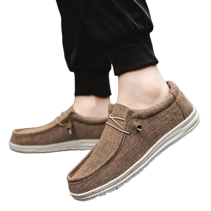 Brown canvas casual shoes with white soles, laces and American flag design