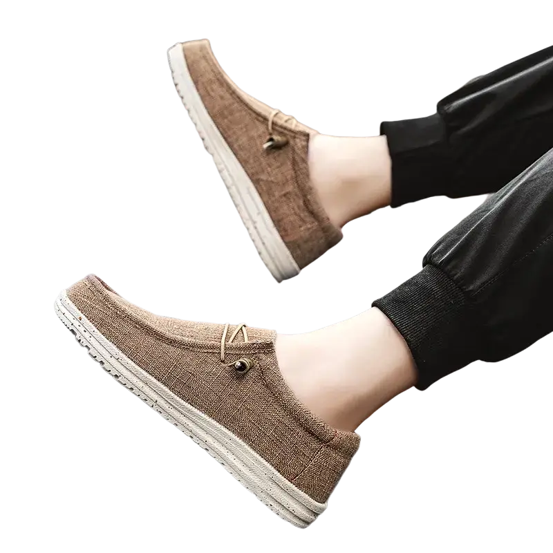 Brown canvas slip-on casual shoes with woven soles and American flag design