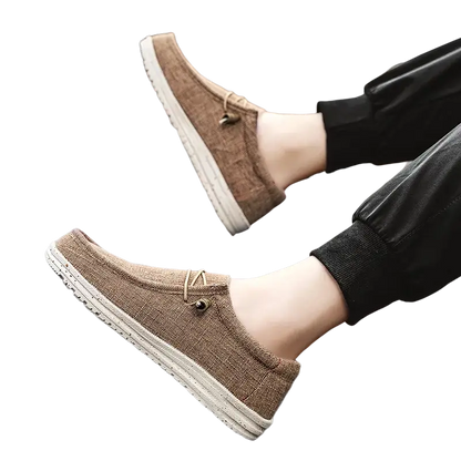 Brown canvas slip-on casual shoes with woven soles and American flag design