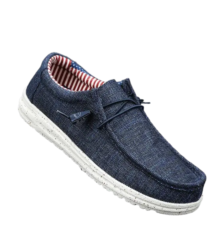 Navy blue casual shoes with white sole, red lining and American flag design