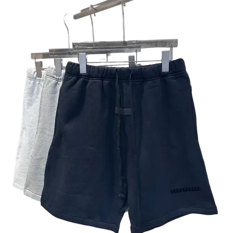 Navy blue drawstring jogger shorts with white hip hop logo