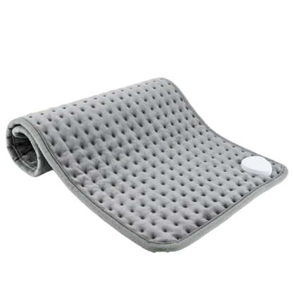 Gray textured dimpled surface of a dark grey electric heating blanket for sofa bed