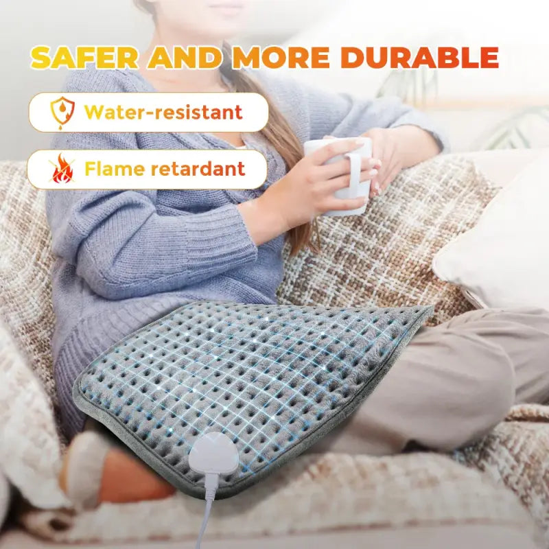 Blue-gray electric heating blanket with textured waffle pattern for sofa bed use