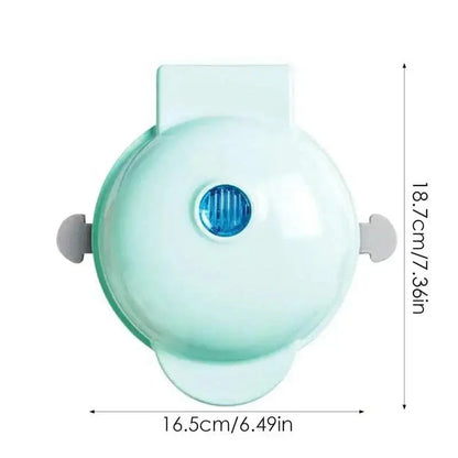 Mint green face mask with gray straps and blue valve for waffles kitchen cooking safety