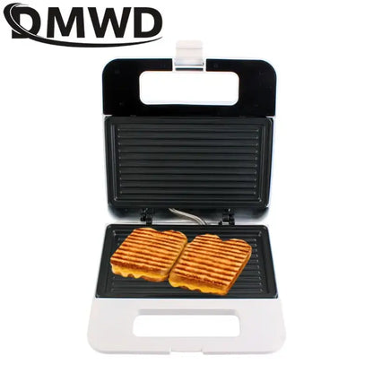 White and black Panini sandwich machine with grilled sandwiches in a multifunction baking pan