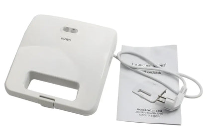 White electric Panini sandwich machine with instruction manual and power cord