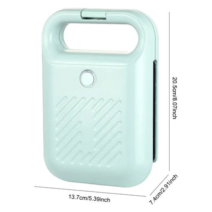 Mint green portable handheld fan beside Electric Sandwich Maker Panini Press