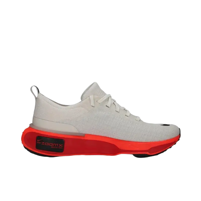 White and red Reebok running shoes with mesh upper and cushioned support