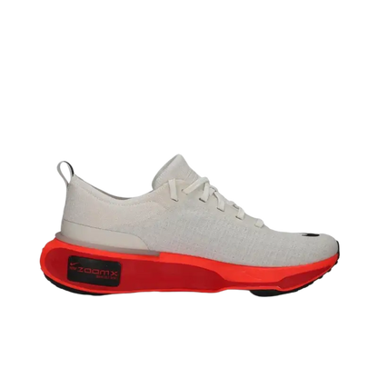 White and red Reebok running shoes with mesh upper and cushioned support