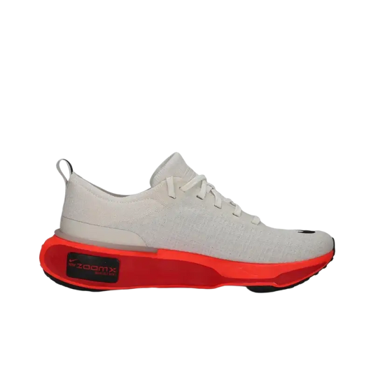 White and red Reebok running shoes with mesh upper and cushioned support