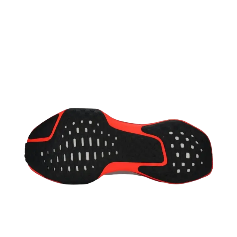 Black and red Nike Air Max running shoes sole with white speckles and cushioned design