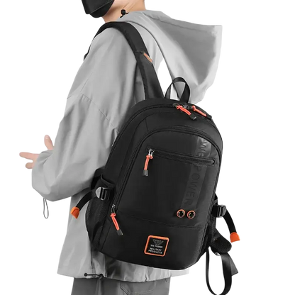 Black backpack with orange accents and zippered compartments, made of quality nylon fabric