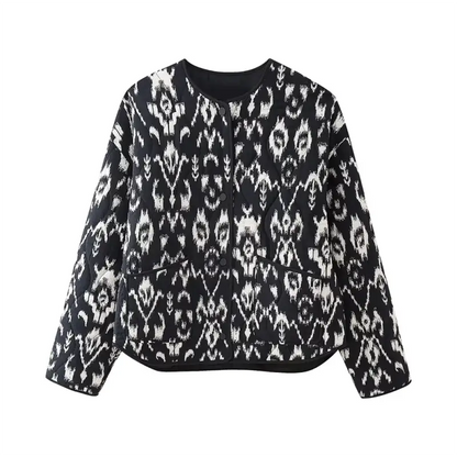 Black and white ikat patterned sweater in versatile printed quilted round jacket coat